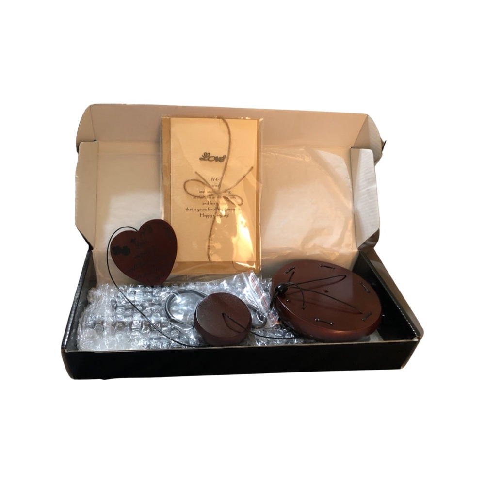 Brand new set of 32” deep toned Bereavement wind chimes. New in the box.